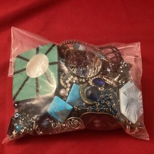 633 grams of green and blue costume jewelry